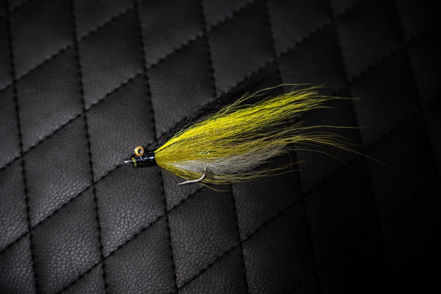 Yellow black and white handmade bucktail lure